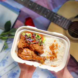 Filipino chicken with pickled vegetables and garlic fried rice.