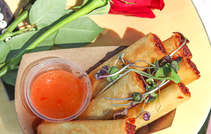 Malaya Eats' lumpia: a Filipino fried egg roll with a side of sweet chili sauce.